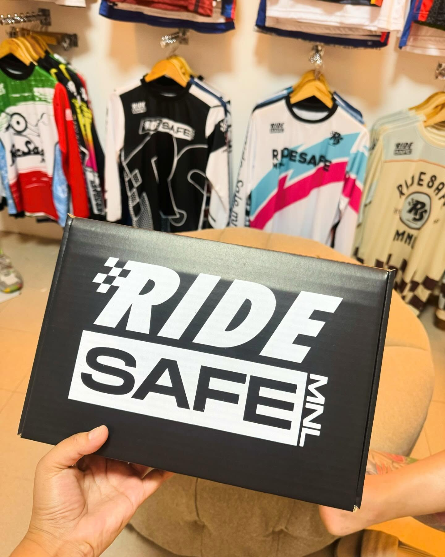 Complete Ride Safe MNL packaging and apparel display